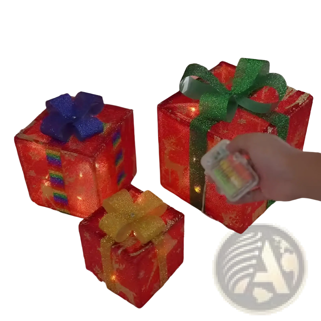 Led christmas gift box set with red glitter boxes illuminated by lights and decorated with blue green and gold bows