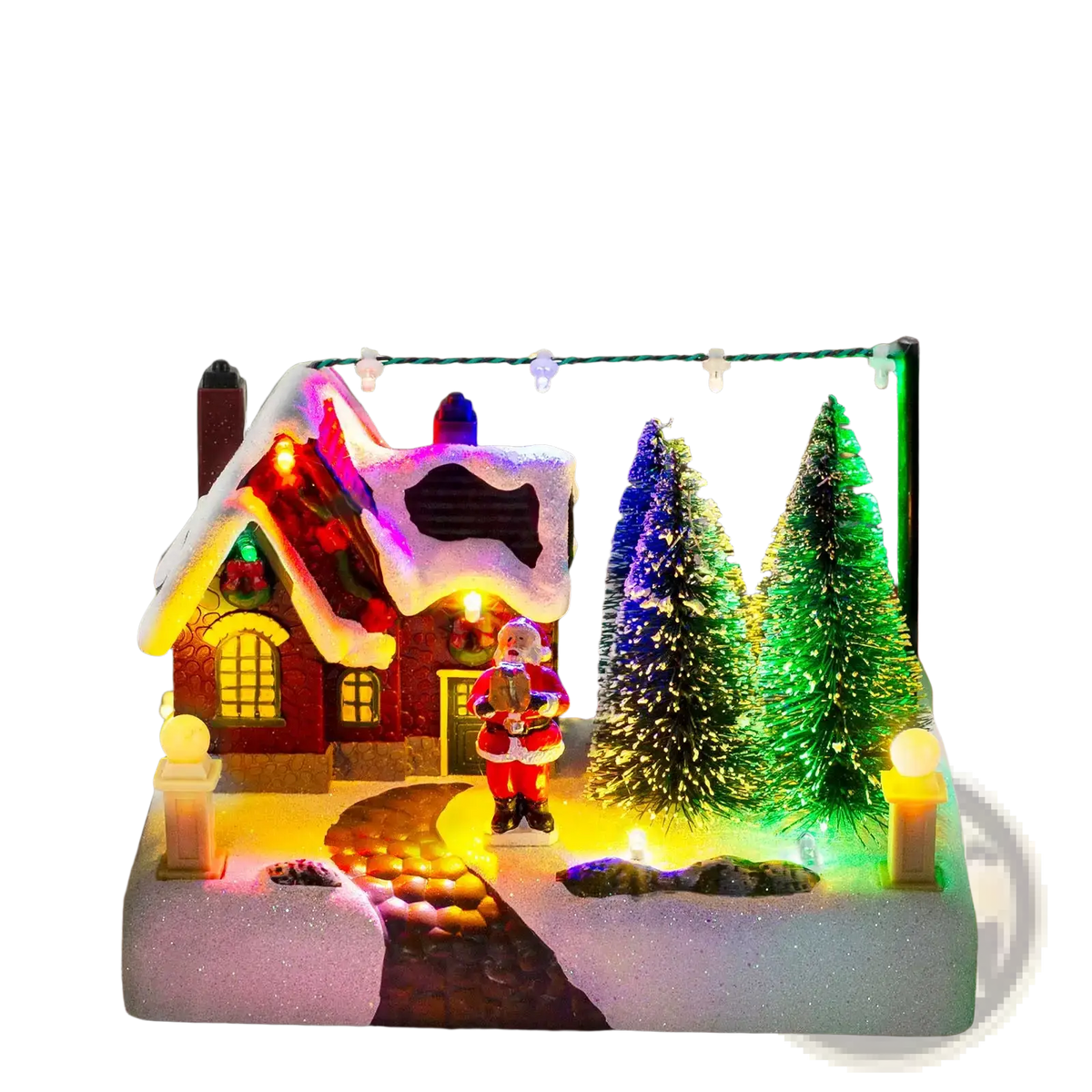 Led Christmas village house with Santa and snow featuring a red snow-dusted roof and glowing windows with colorful trees