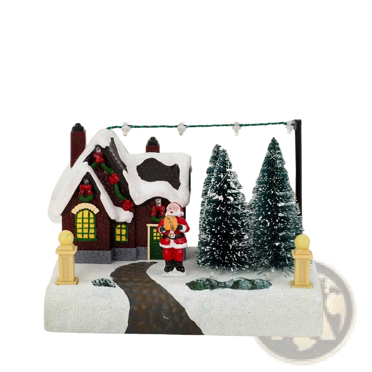 Led christmas village house with santa and snow features a miniature snow-covered roof and frosted pine trees on a glittery base