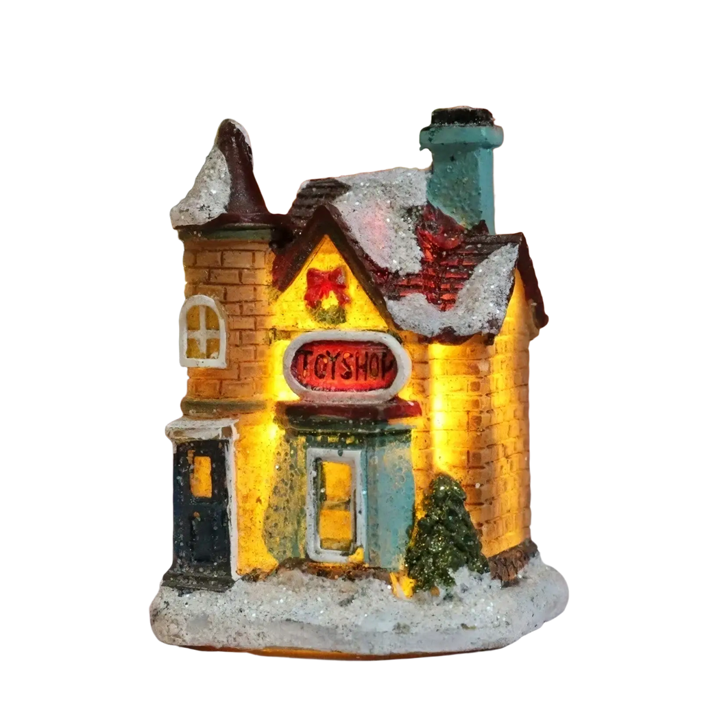 Led christmas village houses battery operated night light featuring a miniature illuminated brick toyshop with snow roof