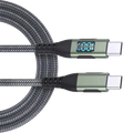 A sleek black braided usb-c fast charging cable with metallic green connectors and led digital display for data transfer