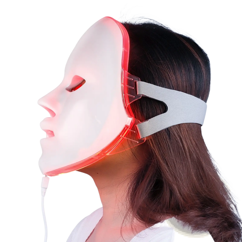A sleek white led facial mask with red light photon therapy and a gray adjustable headband for skin treatment