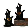 Led halloween ghost tree light spooky decoration featuring black tree figurines with glowing orange eyes and teeth
