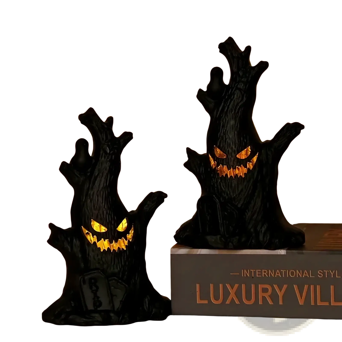 Led halloween ghost tree light spooky decoration featuring black tree figurines with glowing orange eyes and teeth