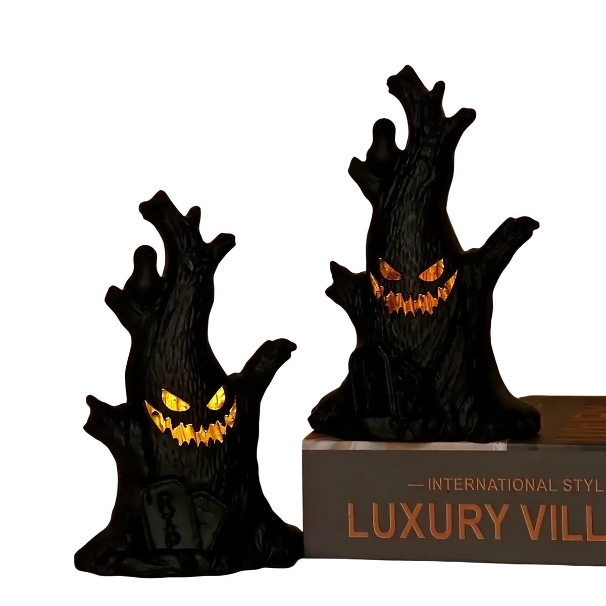 Black spooky tree-shaped led halloween ghost tree light with glowing orange eyes and teeth for decoration