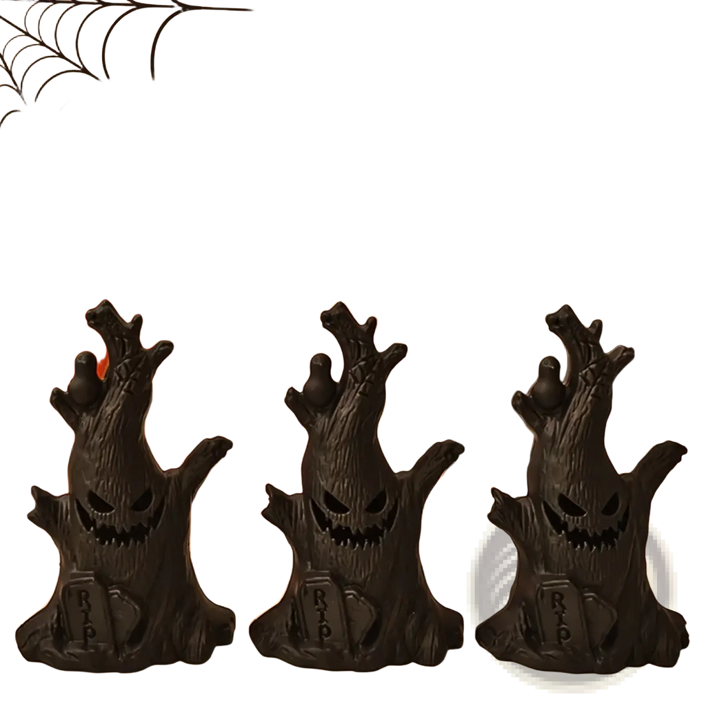 Led halloween ghost tree light featuring three black plastic gravestone figurines with carved faces and rip inscriptions