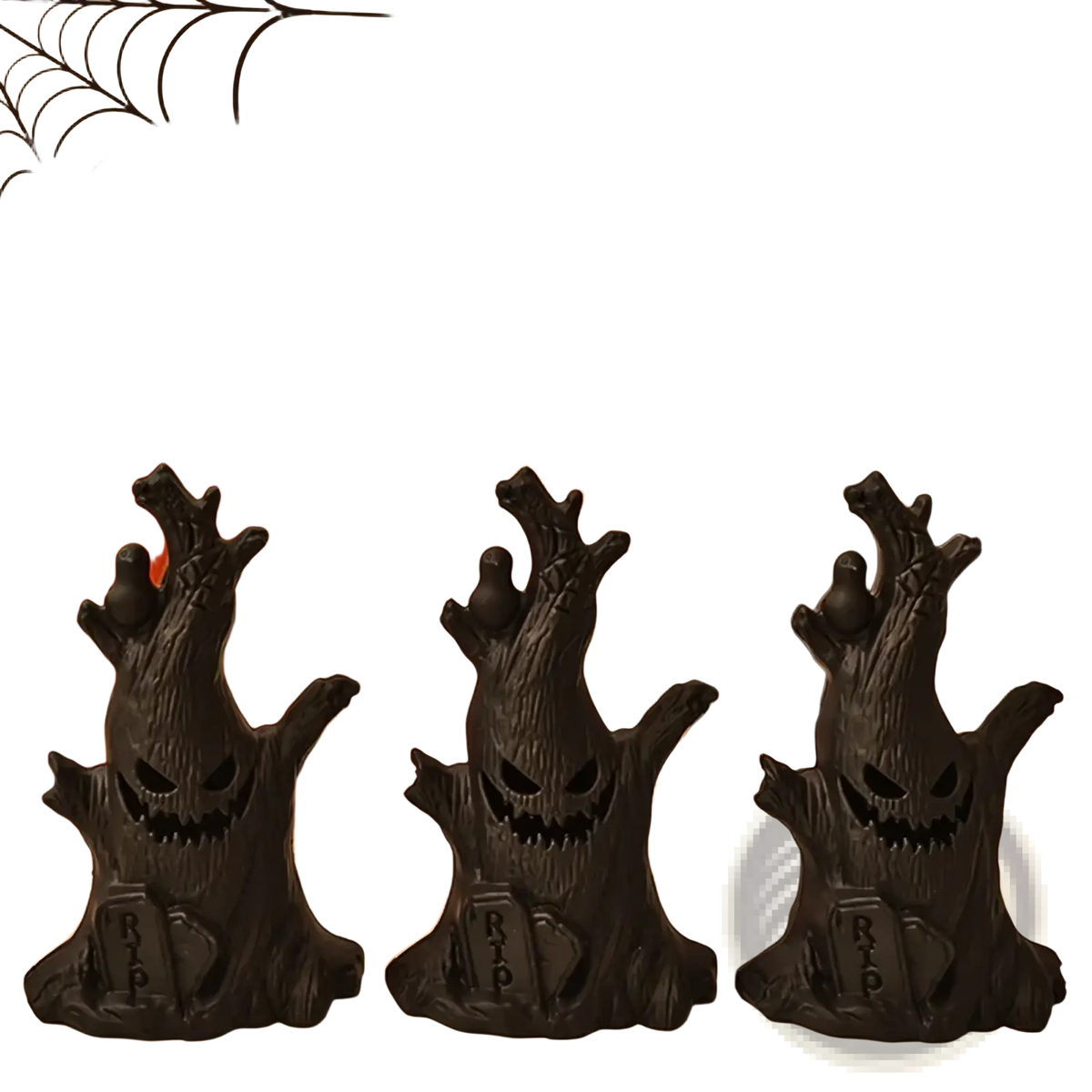 Led halloween ghost tree light featuring three black plastic gravestone figurines with carved faces and rip inscriptions