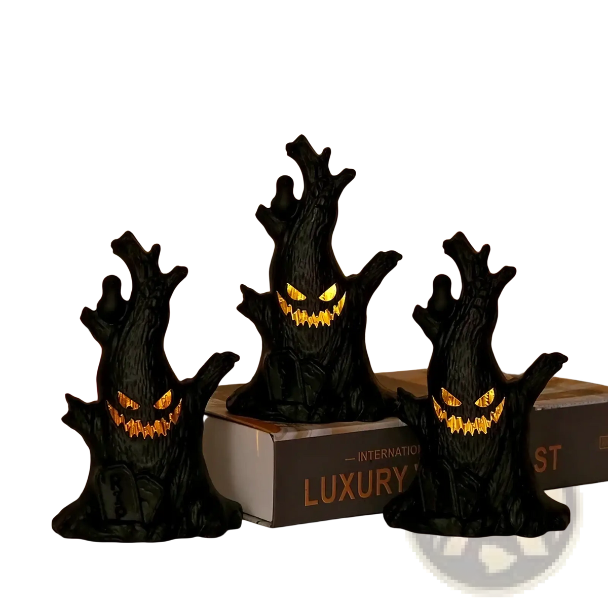Three black led halloween ghost tree figurines with glowing orange eyes and teeth spooky decoration light