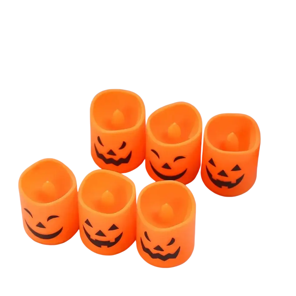 Six orange plastic LED halloween pumpkin lights with black jack-o-lantern faces in a six-pack set