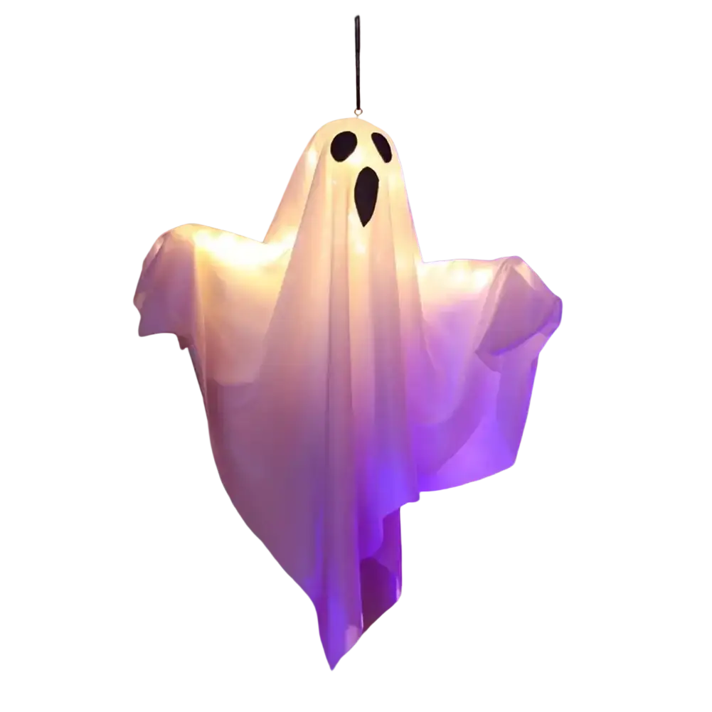 Led hanging ghost decoration glowing translucent white with black cutouts illuminated by soft purple light