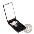 Black compact led makeup mirror with folding case containing five black handled makeup brushes for travel use