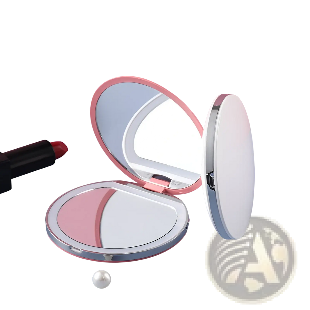 A compact round led makeup mirror with pink and silver frame portable usb folding for travel and touch-ups