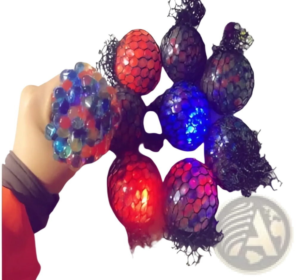 A hand holds a transparent led mesh stress ball filled with glowing multicolored gel beads for squeezing