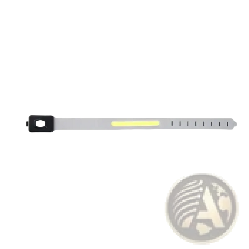 A sleek silver led running arm light rechargeable safety band with a black switch and yellowish integrated glow