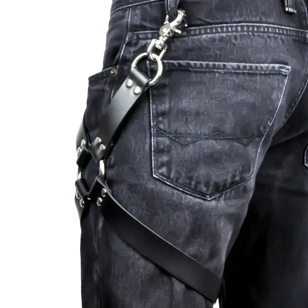 Adjustable black leather hip harness with silver-toned metal hardware and adjustable straps shown from the back side