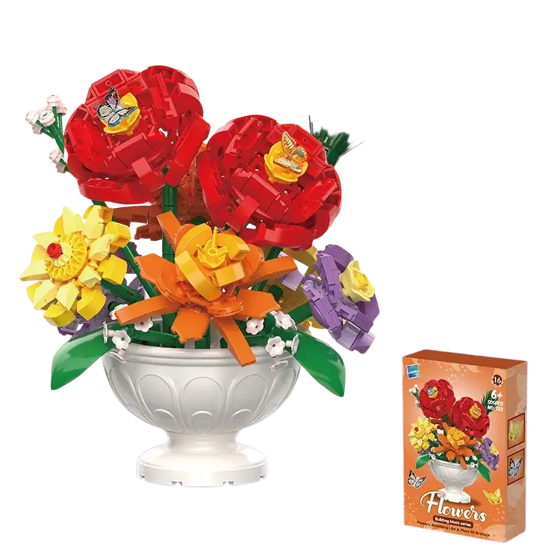 A vibrant lego compatible building block flower potted plant toy with red yellow orange and purple blossoms in a white vase