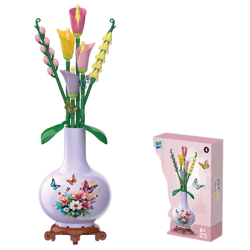White ceramic vase with colorful floral and butterfly decals holding lego compatible plastic calla lily block flowers