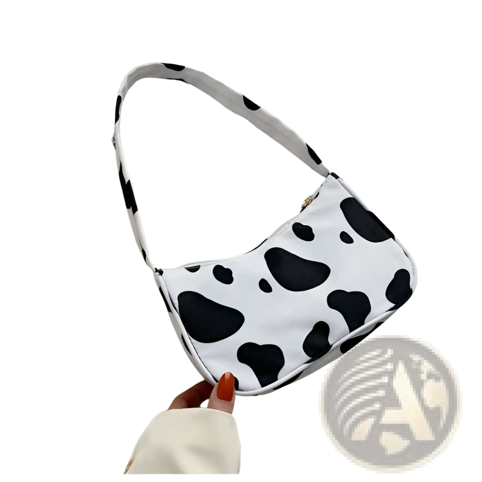 A white nylon underarm shoulder bag with a black cow print pattern and matching strap