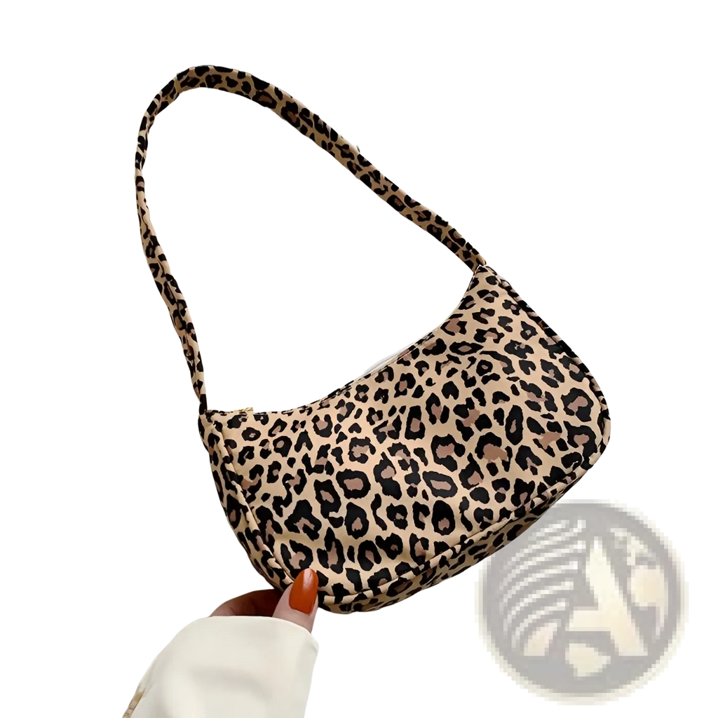A beige and black leopard print nylon shoulder bag with a curved soft silhouette for underarm use