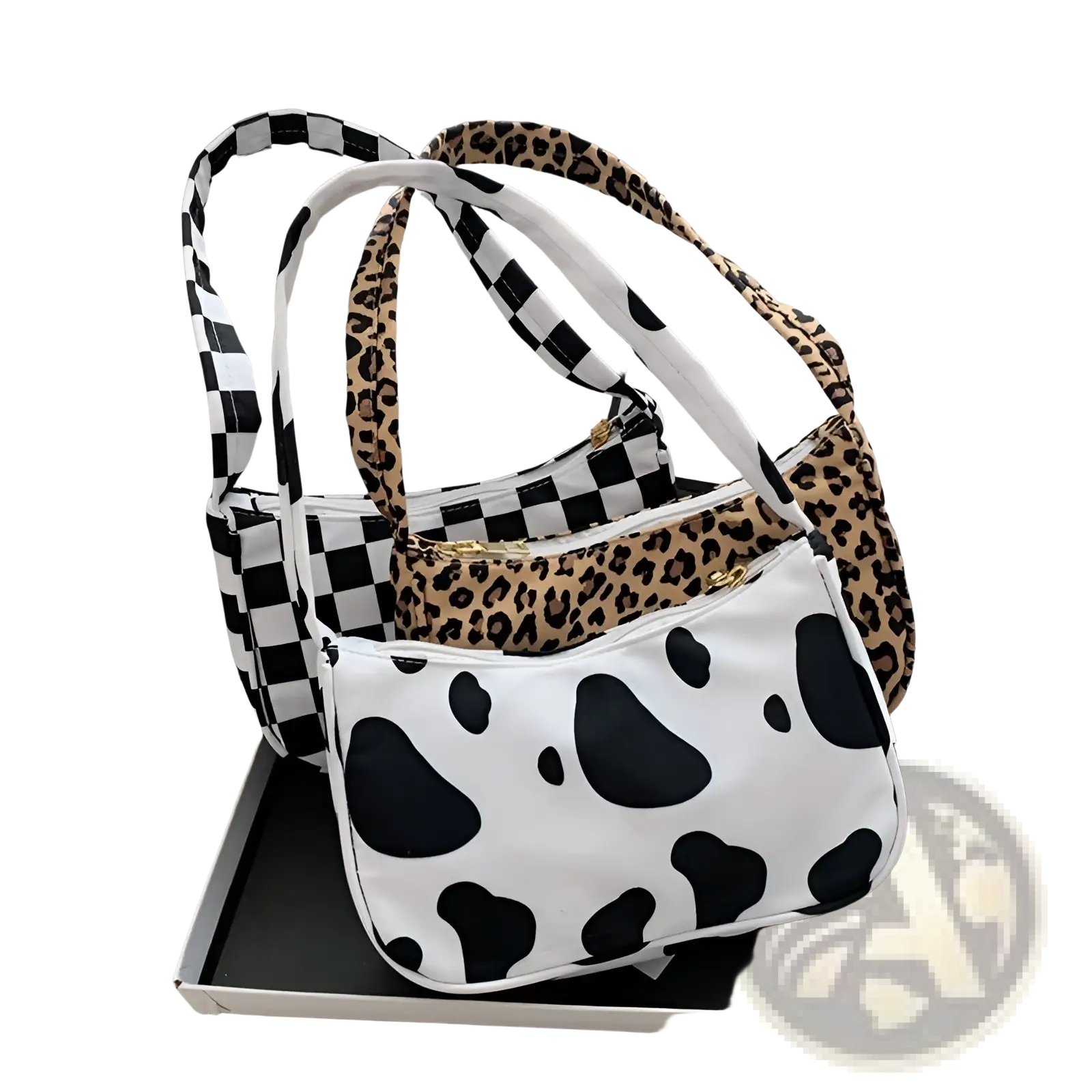 White cow print shoulder bag with black spots and gold zipper made of nylon for underarm use in leopard print and checkered style