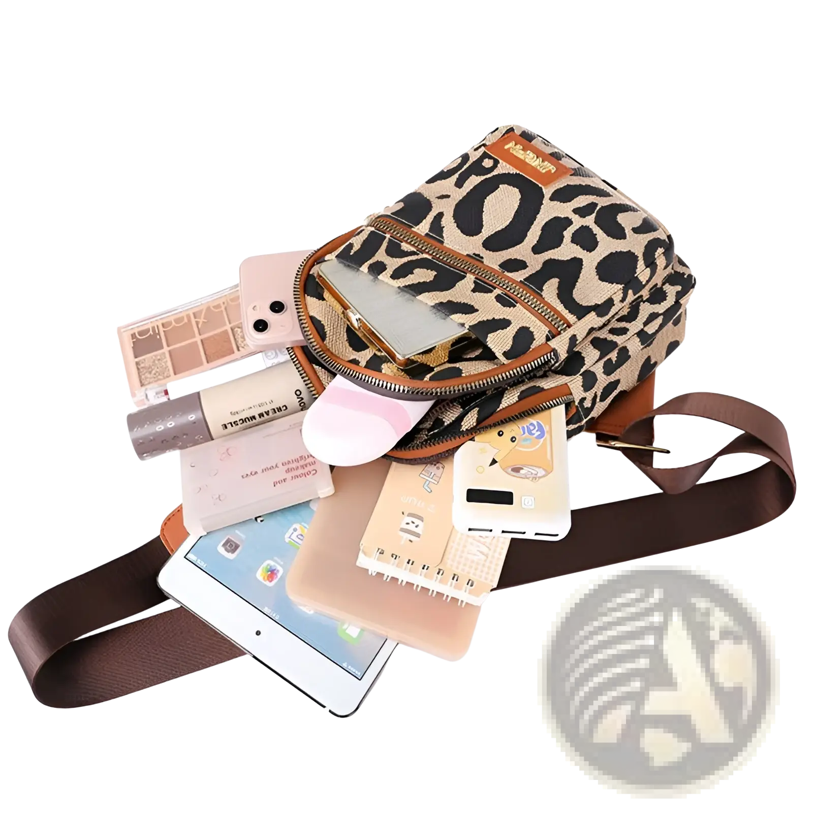 Leopard print canvas crossbody bag with brown leather trim and adjustable strap featuring headphone jack