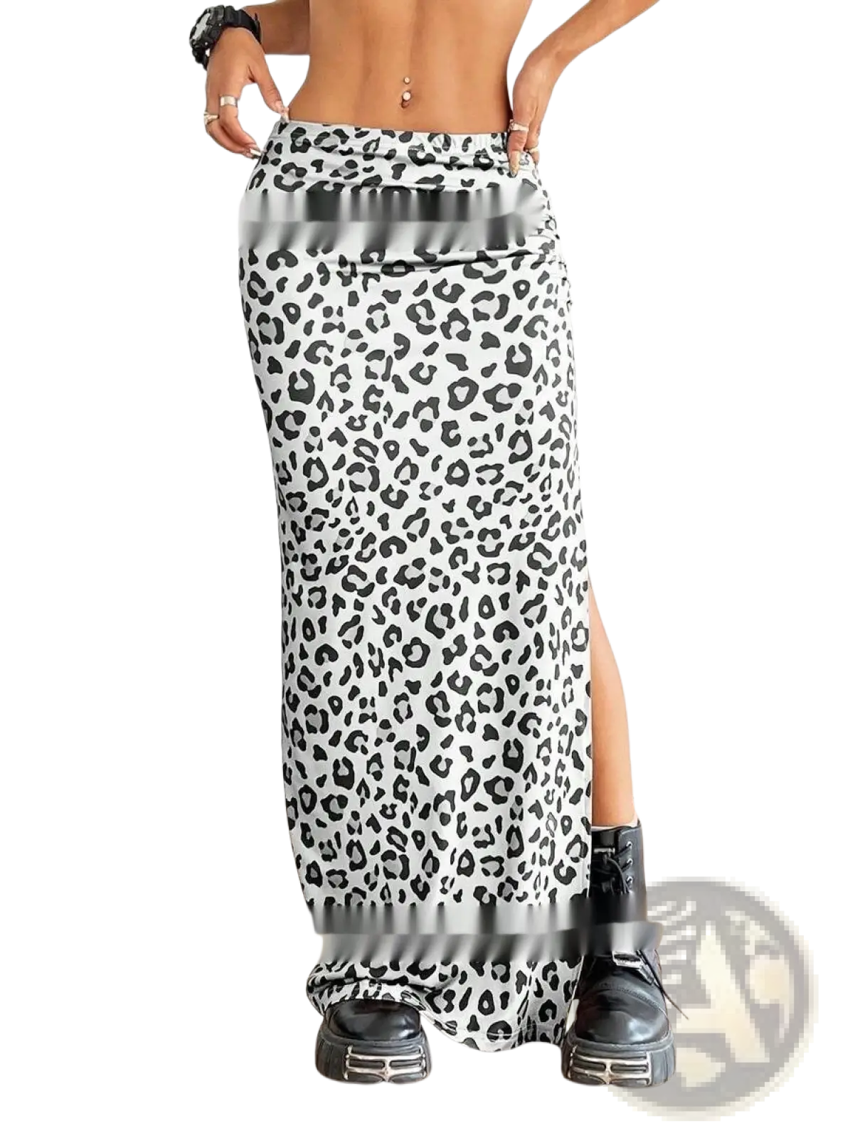 A black and white leopard print high waisted maxi skirt with a side slit and flowing fabric