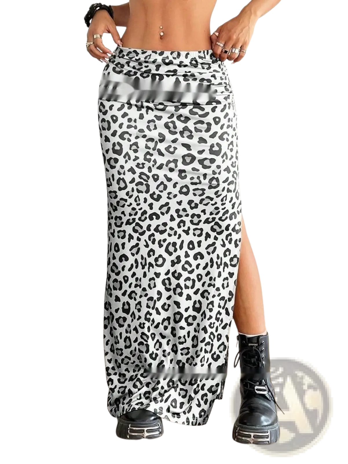 A flowing white and black leopard print high waisted maxi skirt with side slit and elasticated waistband