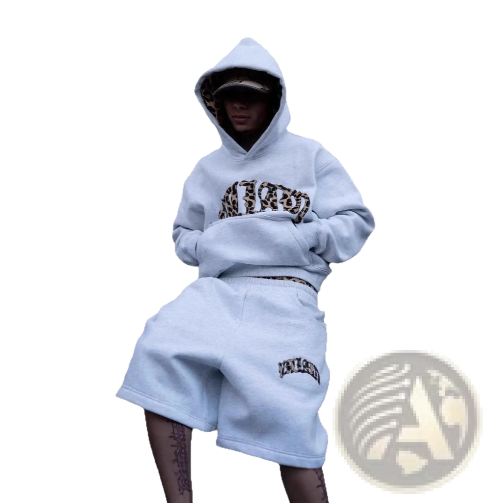 Light blue leopard print hoodie and matching shorts set with embroidered logo on left leg in comfortable fabric
