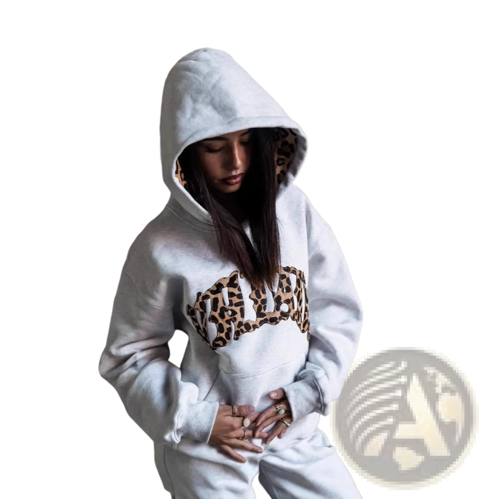 White hoodie with leopard print lettering and matching leopard print hood lining from leopard print hoodie and sweatpants set