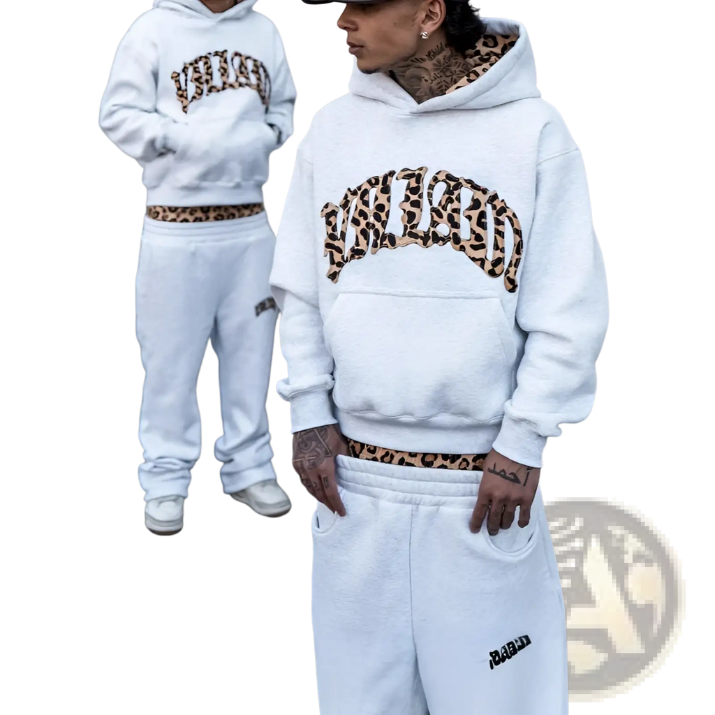 White hoodie with leopard print lettering and matching waistband part of leopard print hoodie and sweatpants set