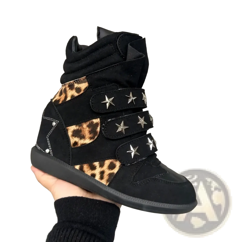 Black leopard print wedge ankle boots with silver star studs on high-top sneaker style straps