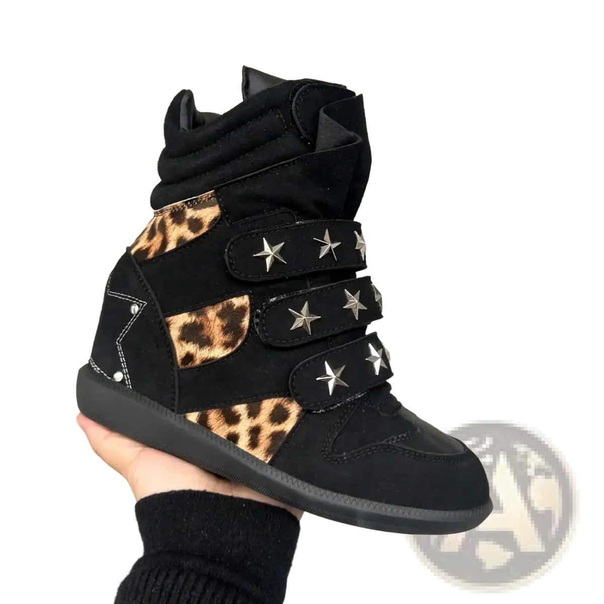 Black leopard print wedge ankle boots with silver star studs on high-top sneaker style straps