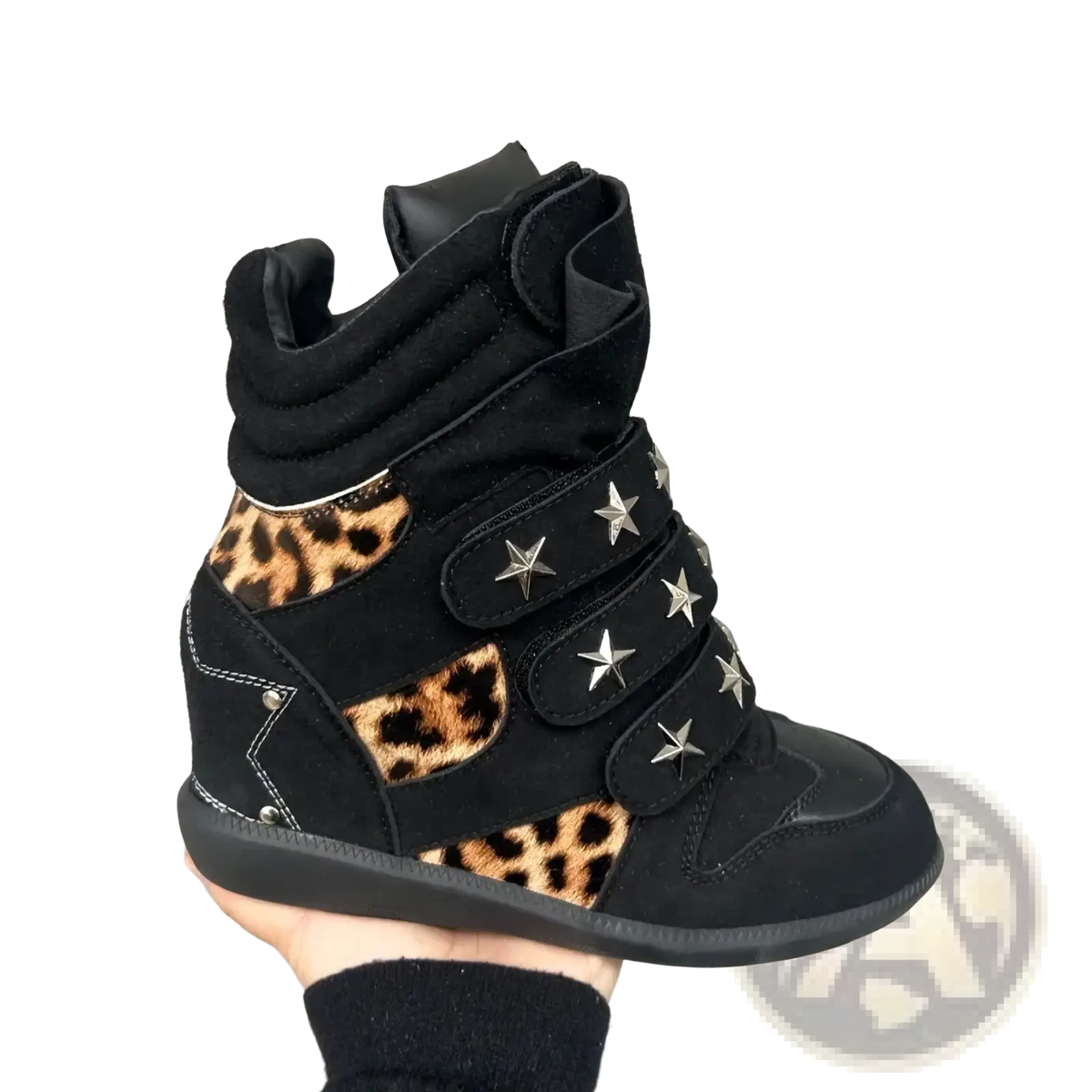 Black wedge sneaker with leopard print accents and silver star embellishments in leopard print wedge ankle boots design