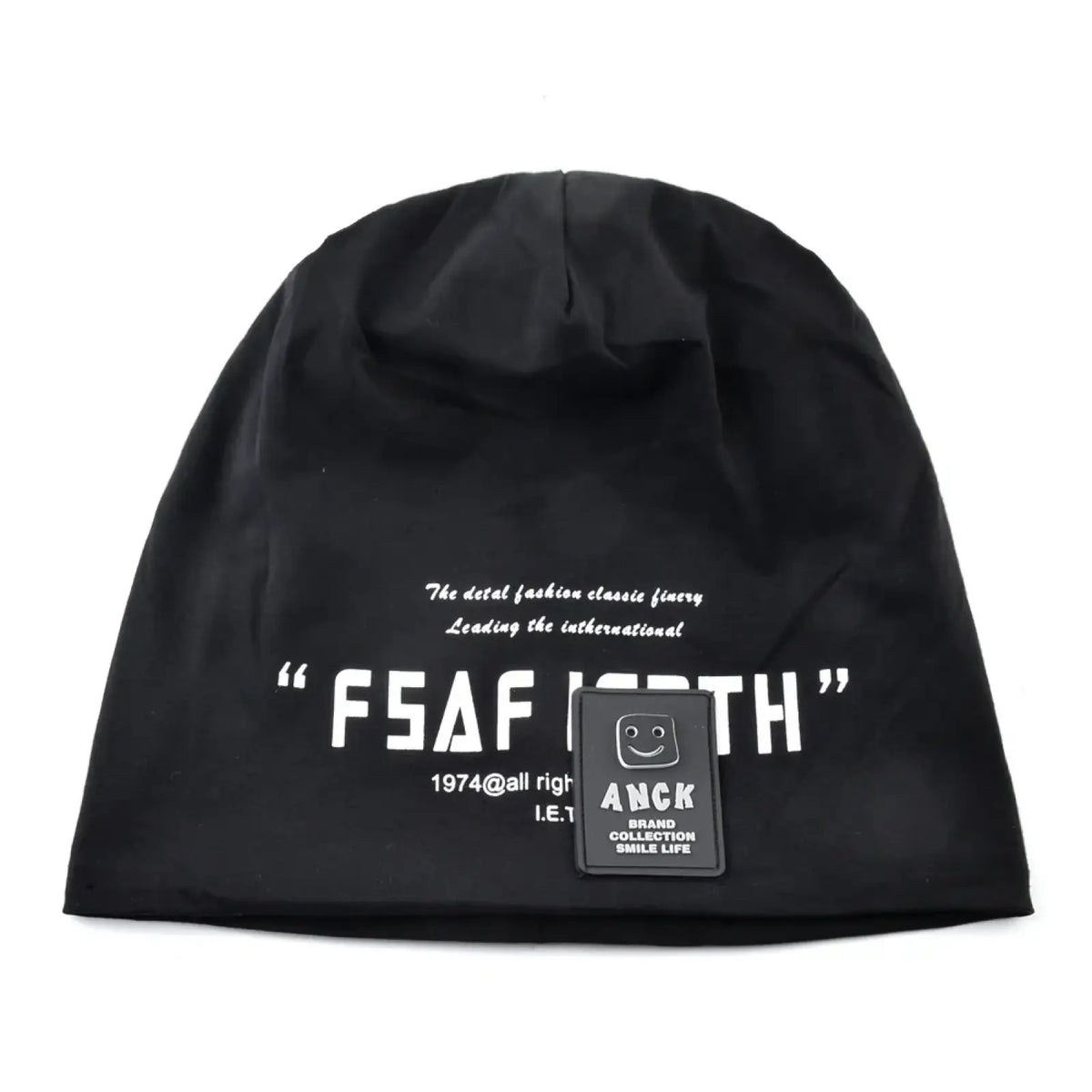 Black knit beanie hat with white letter print and small black anck brand patch for casual streetwear use