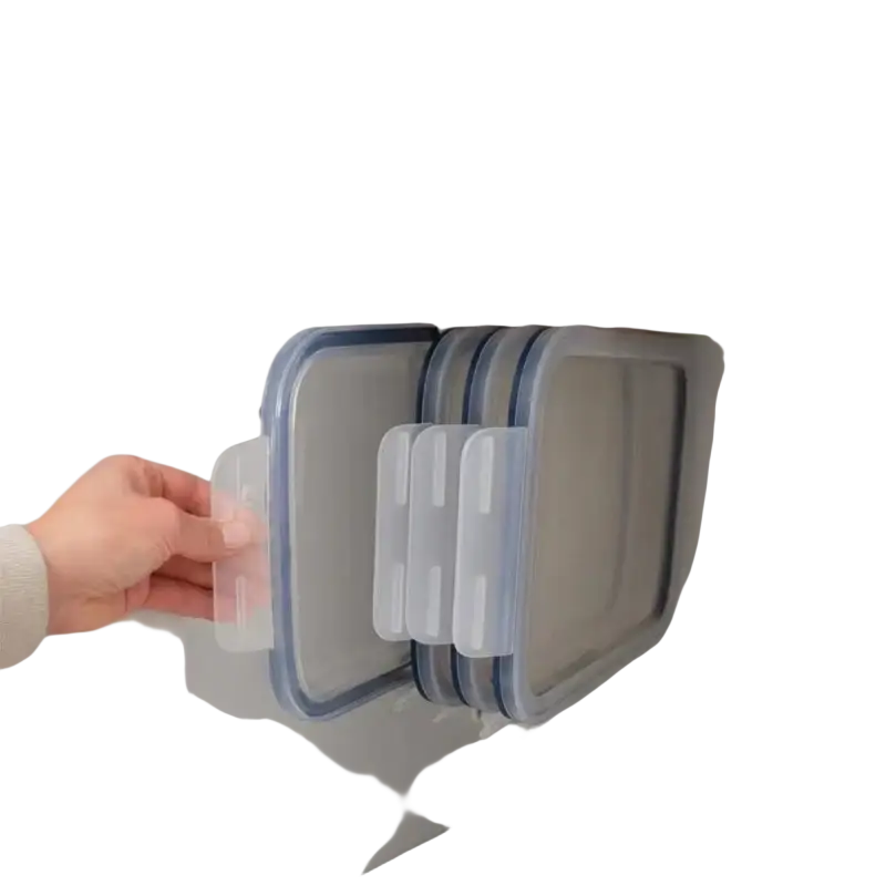 Clear plastic food storage containers with blue sealing edges neatly stacked in beige lid storage rack for space saving use