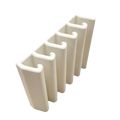 Off-white plastic u-channel connectors with smooth surface arranged in a row for space saving lid storage rack