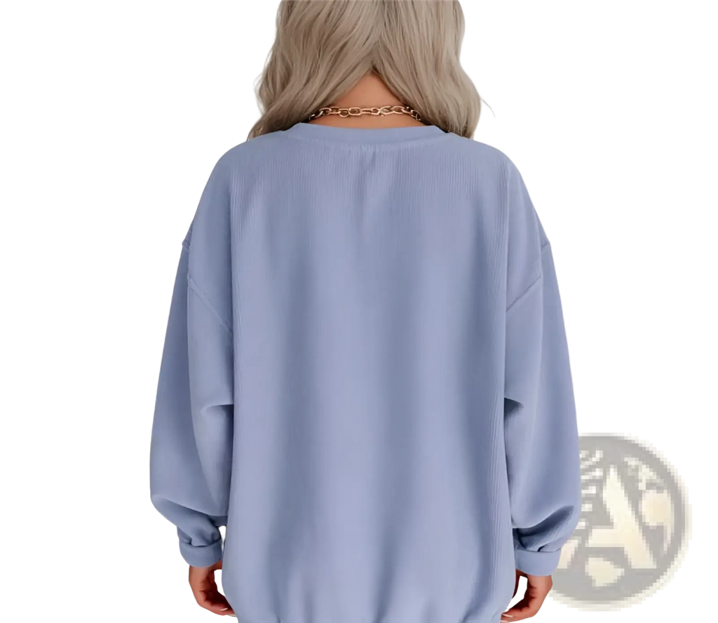 Light blue ribbed knit oversized sweatshirt shown from the back featuring a comfortable casual fit