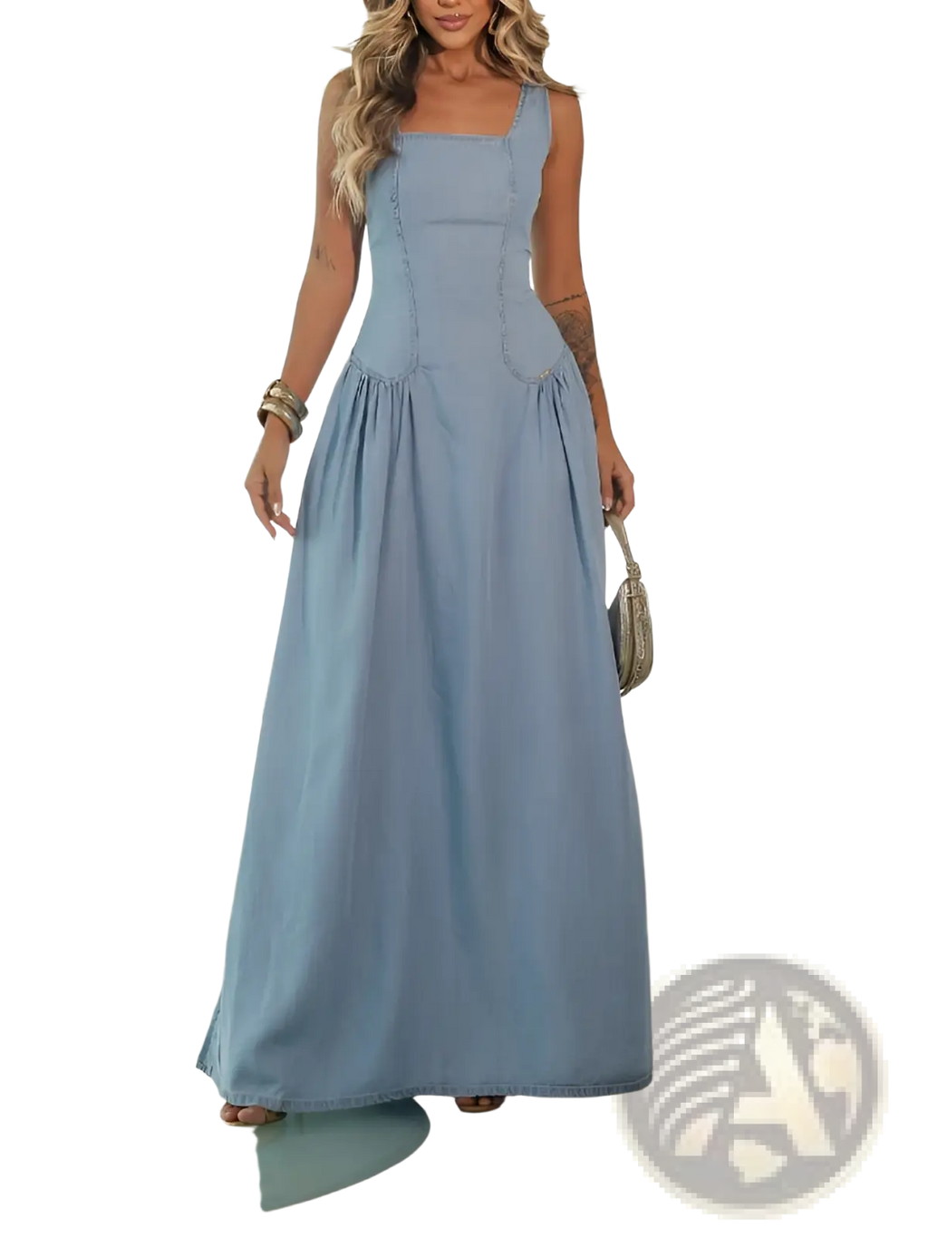 A flowing light blue denim maxi dress with a square neckline fitted bodice and side slit