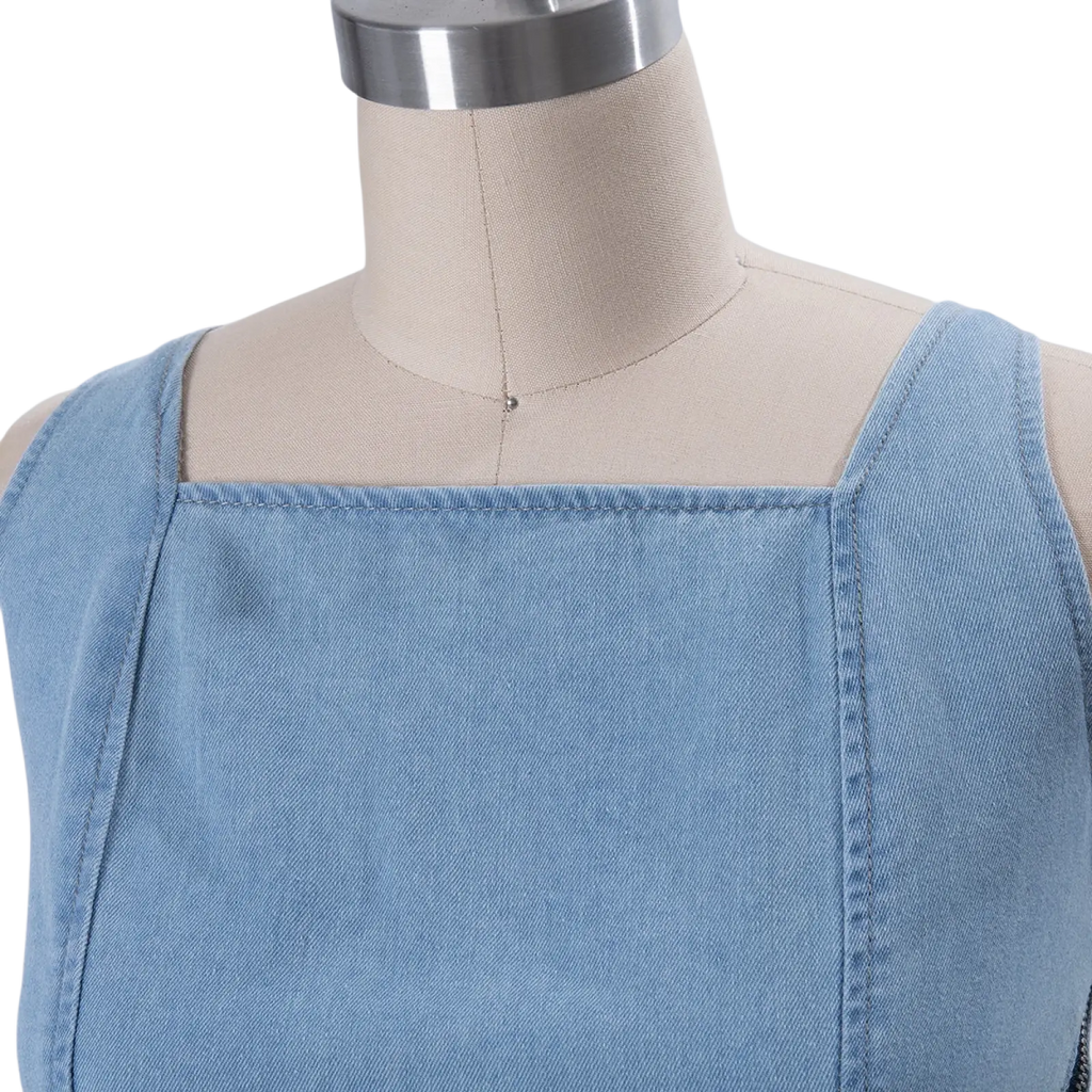Light blue denim sleeveless maxi dress with square neckline visible stitching and side slit for stylish wear