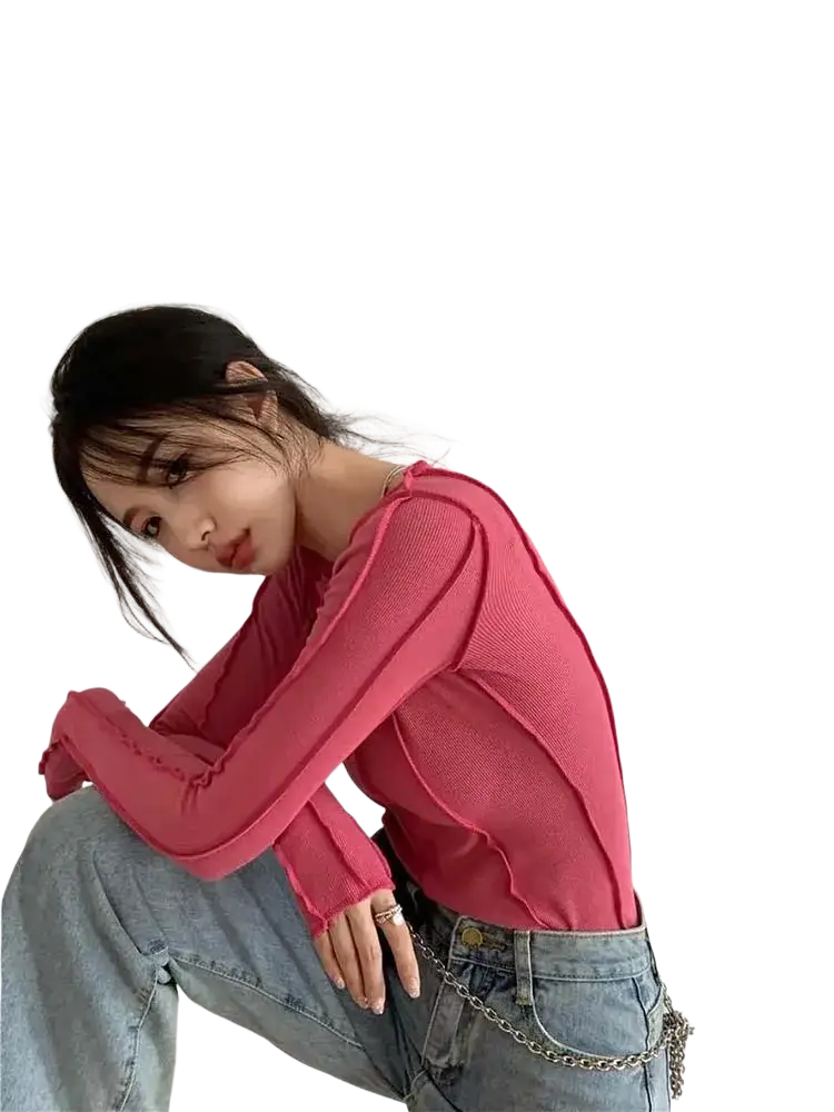 A fitted pink ribbed long sleeve knit top with high neckline and ruched sleeves for slim casual wear