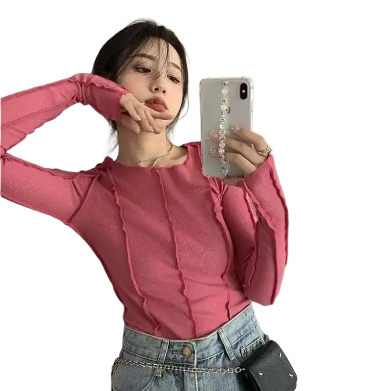 Pink ribbed knit long sleeve top for women with ruched detailing designed for casual and slim fit wear