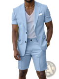 Light blue short sleeve suit and shorts set with black buttons and white pocket square in a lightweight fabric