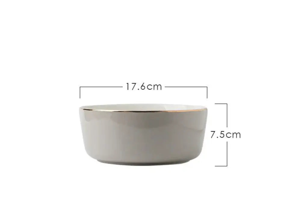 A sleek matte gray ceramic bowl with gold rim 17.6cm diameter by 7.5cm tall from luxury pink and gold script dinnerware set