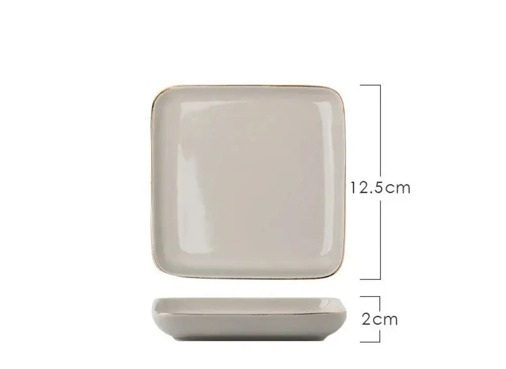 A sleek square ceramic plate with rounded edges and beige glaze from the luxury pink and gold script couple dinnerware set