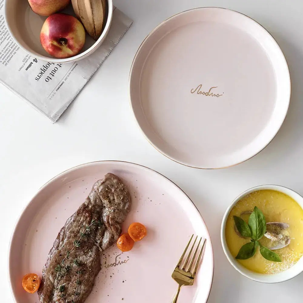 Luxury pink ceramic plate with gold rim and subtle aodoro script logo for couple dinnerware set
