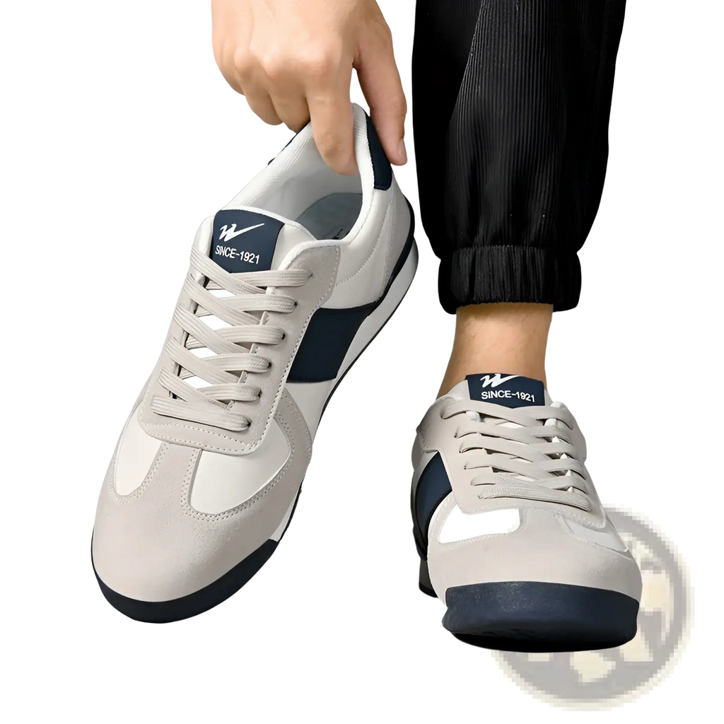 Light running casual women’s fashion sneakers in gray and navy blue suede and leather with white accents and classic design