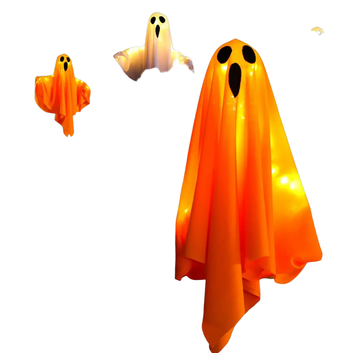 Light up hanging ghost halloween decoration with orange glowing lanterns and black eye mouth cutouts hanging from branches