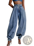 Light wash denim high-rise harem pants with zipper front and cuffed ankles in a casual style