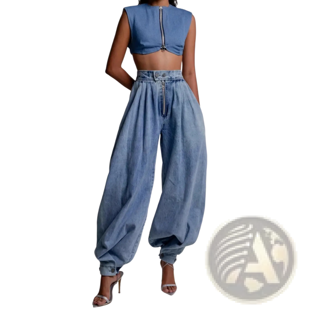 Light wash denim harem pants with high-waisted wide-leg fit and zipper detail at the waistband in blue denim
