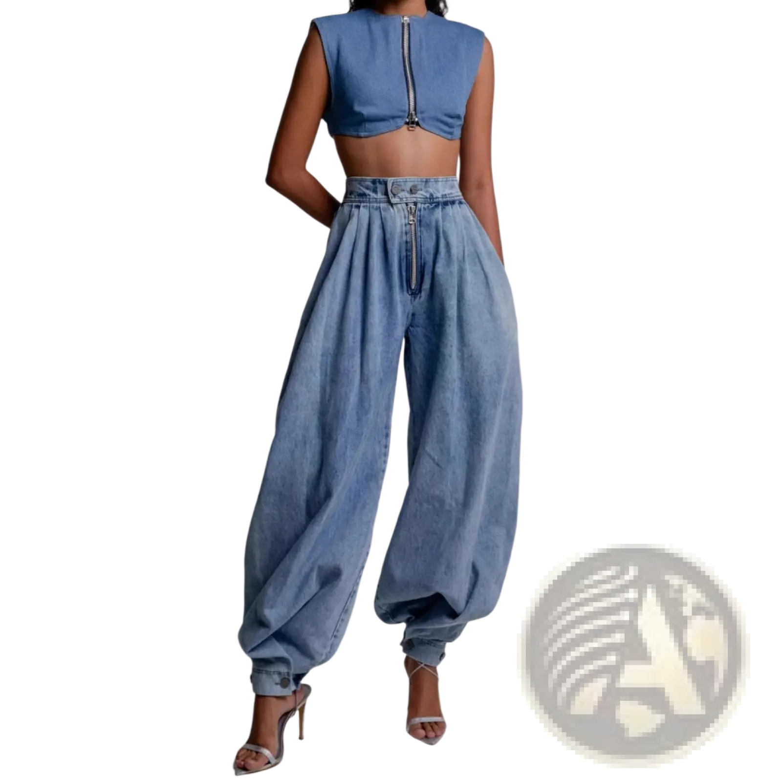 Light wash denim harem pants with high-waisted wide-leg fit and zipper detail at the waistband in blue denim